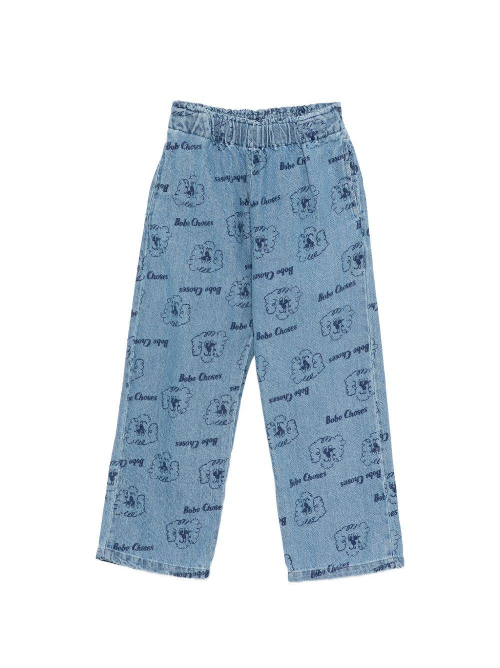 Pantaloni per bambino Bobo Choses denim con stampa Pickles The Dog all - over - Rubino Kids