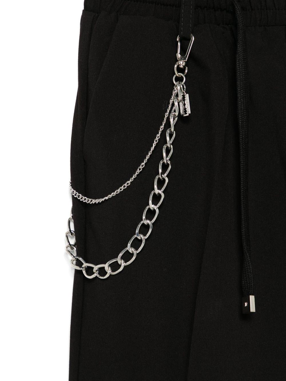 Pantaloni per bambino John Richmond Junior nero con applicazione logo - Rubino Kids