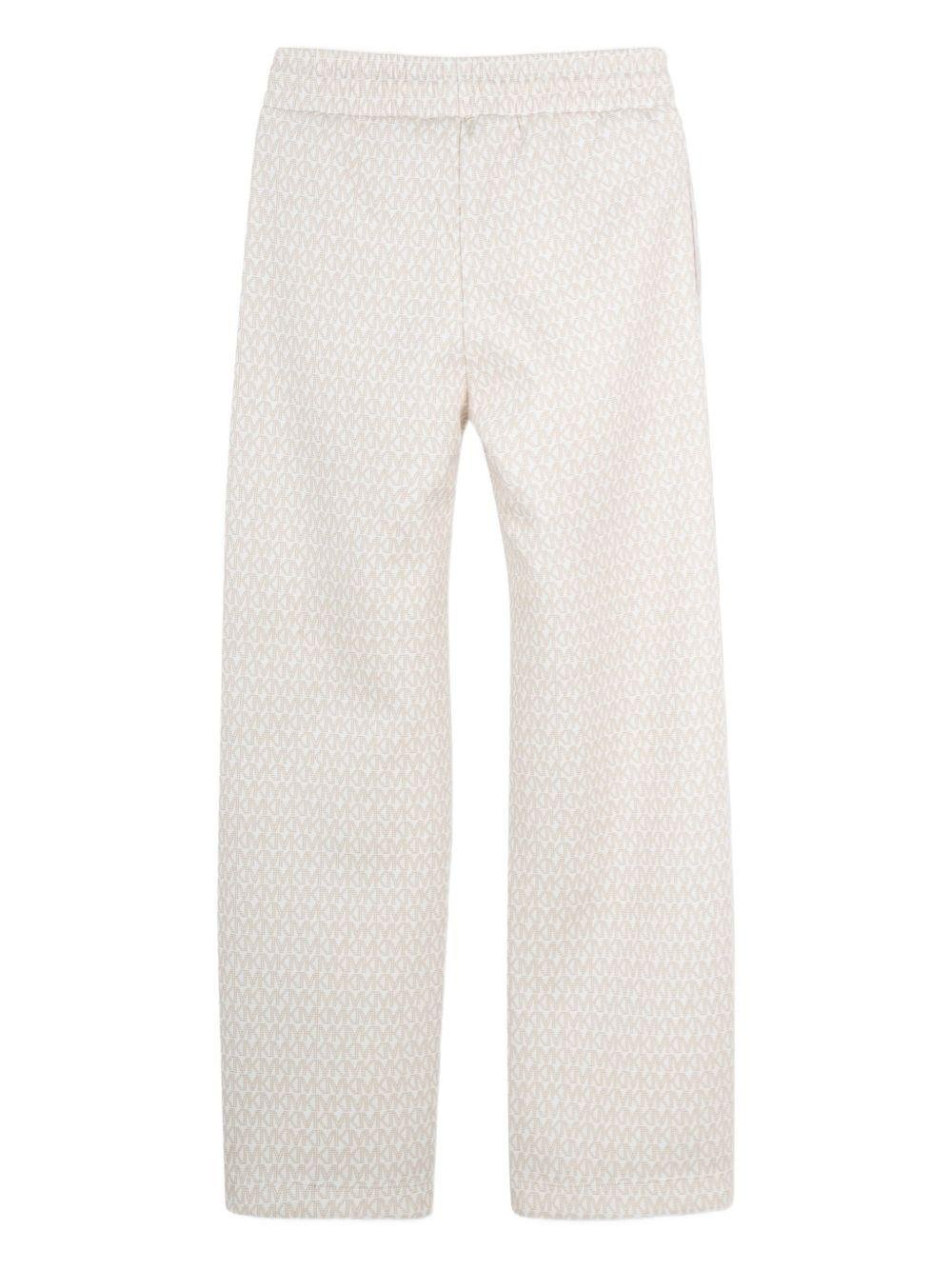 Pantaloni per bambino Michael Kors Kids bianchi con motivo all - over - Rubino Kids