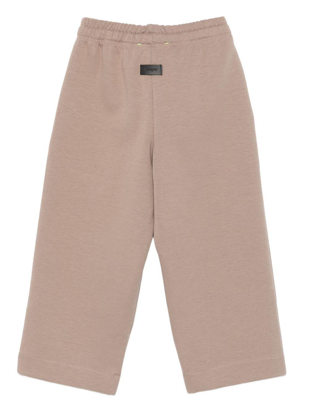Pantaloni per bambino MSGM Kids beige con stampa logo - Rubino Kids