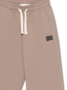 Pantaloni per bambino MSGM Kids beige con stampa logo - Rubino Kids