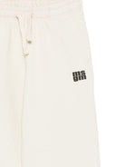 Pantaloni per bambino MSGM Kids bianchi con stampa del logo - Rubino Kids