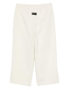 Pantaloni per bambino MSGM Kids bianchi con stampa del logo - Rubino Kids