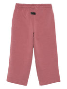 Pantaloni per bambino MSGM KIds rosso con stampa del logo - Rubino Kids