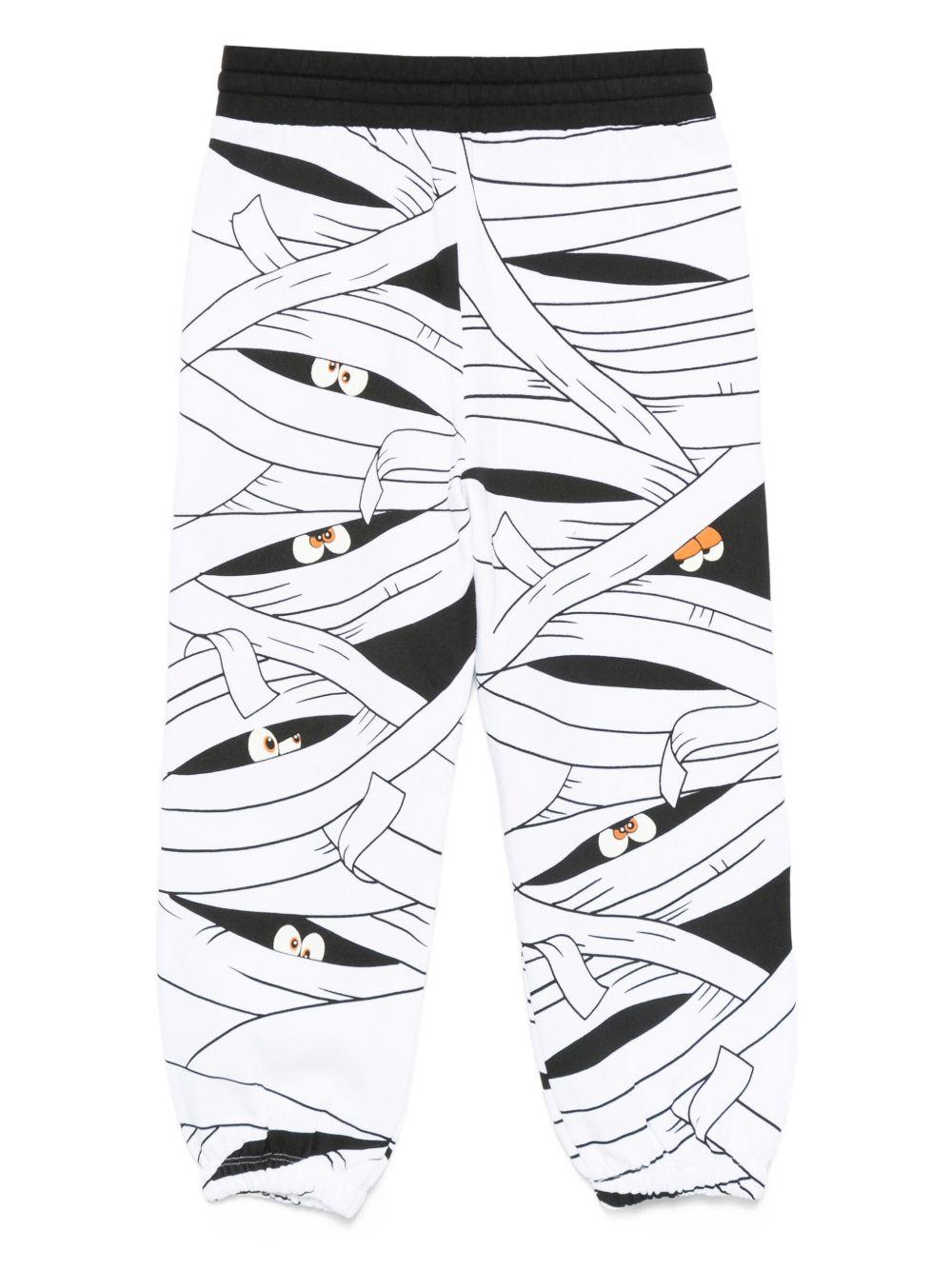 Pantaloni per bambino Stella McCartney Kids bianchi con stampa mummia - Rubino Kids