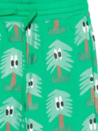 Pantaloni per bambino Stella McCartney Kids verde con stampa di alberi - Rubino Kids