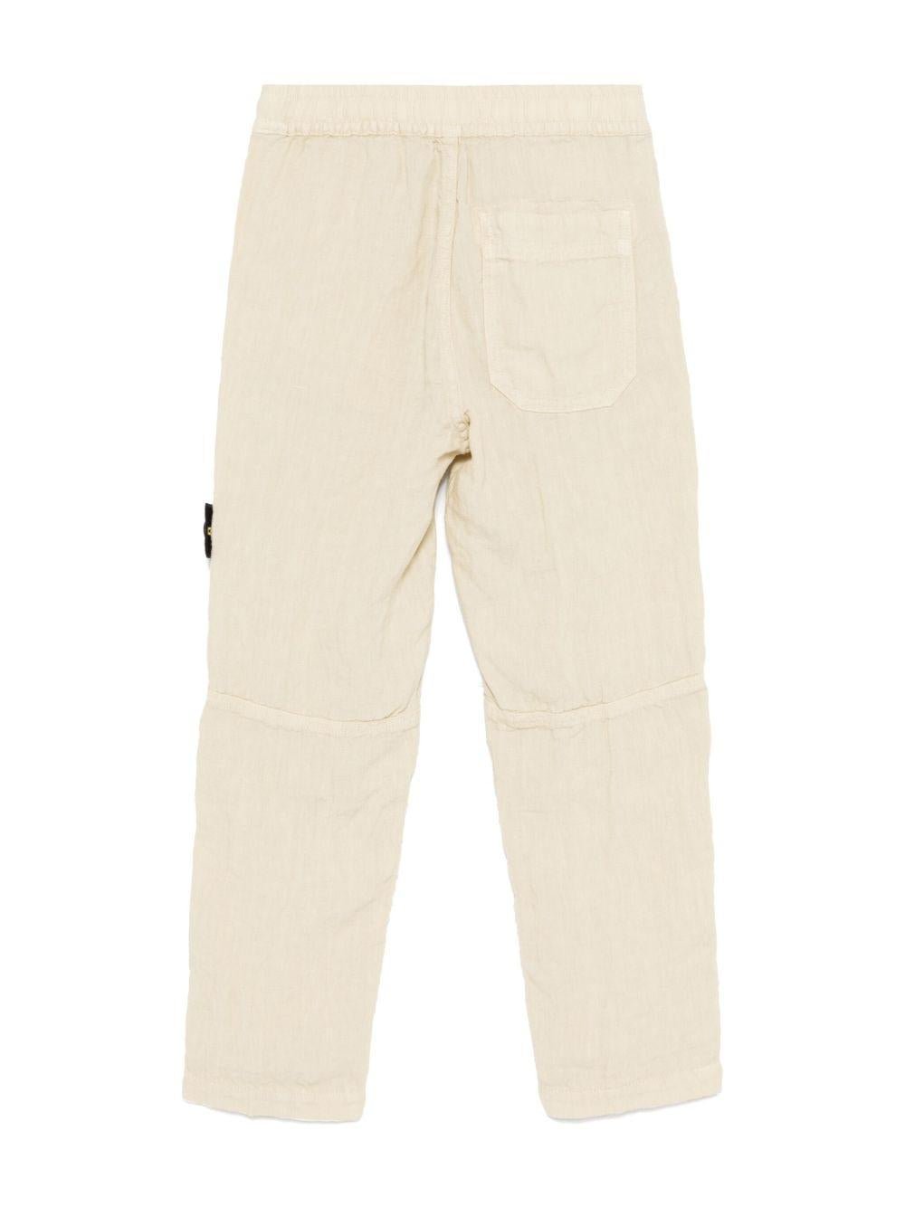 Pantaloni per bambino Stone Island Junior beige con applicazione Compass - Rubino Kids