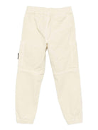 Pantaloni per bambino Stone Island Junior beige in velluto a coste con tasche applicate - Rubino Kids