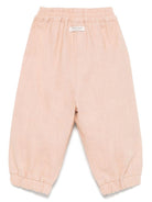 Pantaloni per neonata Donsje Anje rosa con applicazione a fiori - Rubino Kids