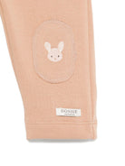 Pantaloni per neonata Donsje beige con toppa coniglio - Rubino Kids