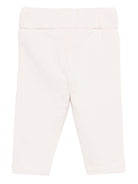 Pantaloni per neonata Donsje bianchi con motivo unicorno - Rubino Kids