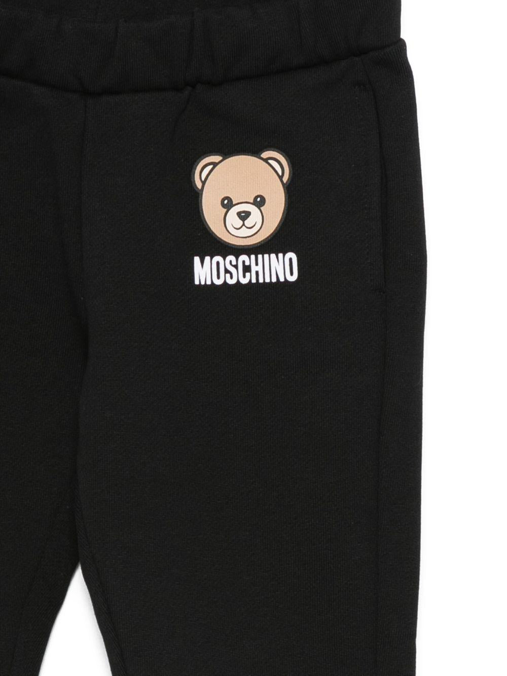 Pantaloni per neonata Moschino Kids nero con logo Teddy Bear - Rubino Kids