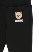 Pantaloni per neonata Moschino Kids nero con logo Teddy Bear - Rubino Kids