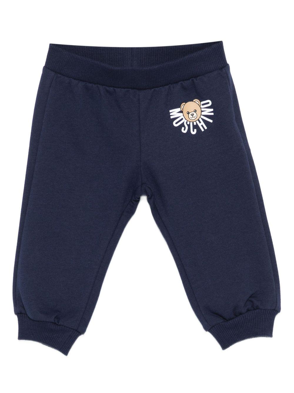 Pantaloni per neonati Moschino Kids blu con logo Teddy Bear - Rubino Kids