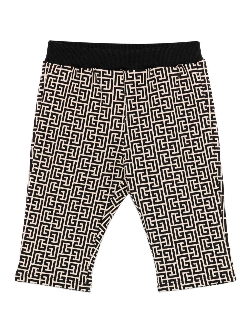 Pantaloni per neonato Balmain Kids beige con motivo monogramma - Rubino Kids