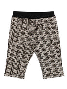 Pantaloni per neonato Balmain Kids beige con motivo monogramma - Rubino Kids