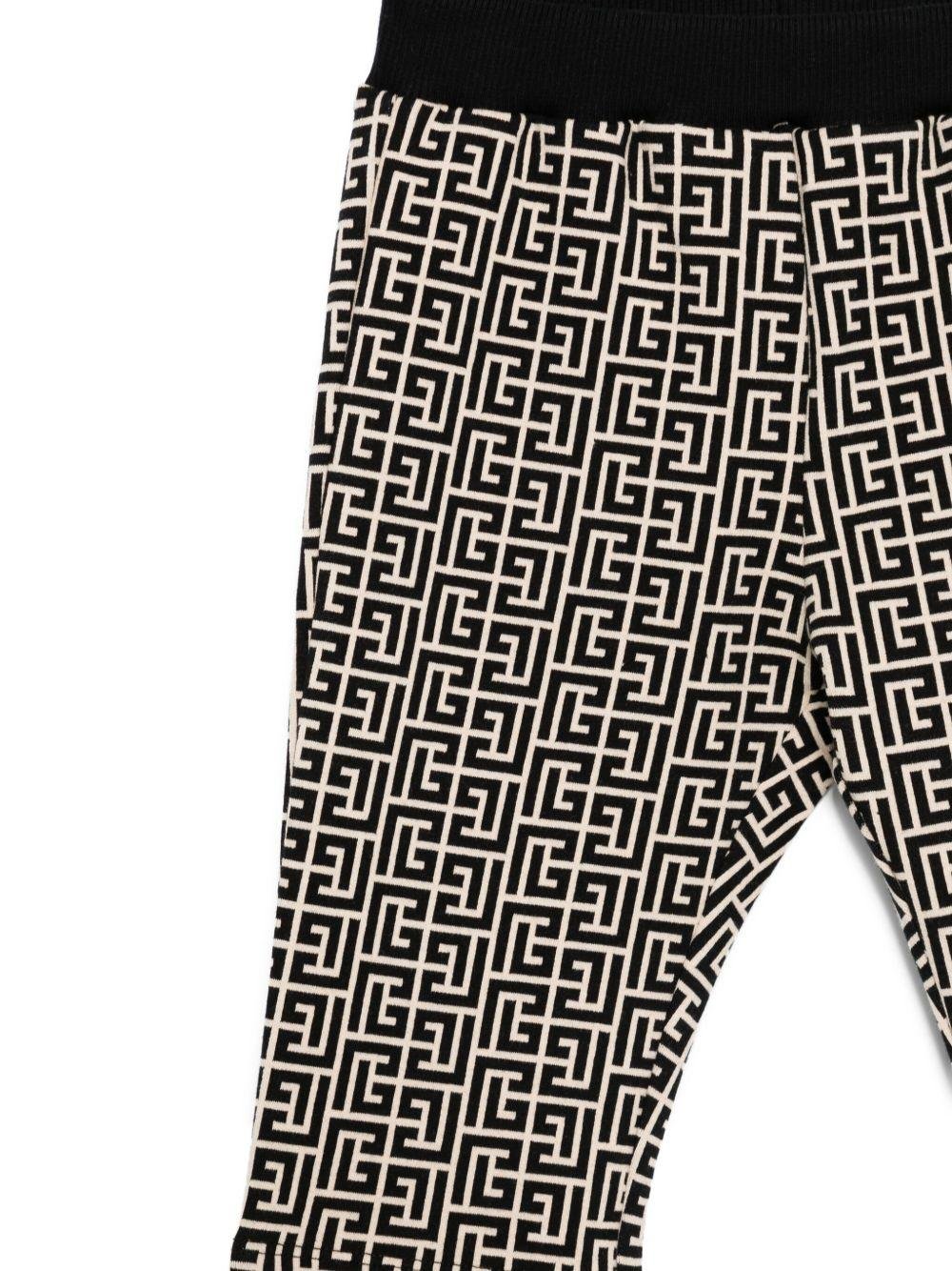 Pantaloni per neonato Balmain Kids beige con motivo monogramma - Rubino Kids