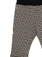 Pantaloni per neonato Balmain Kids beige con motivo monogramma - Rubino Kids
