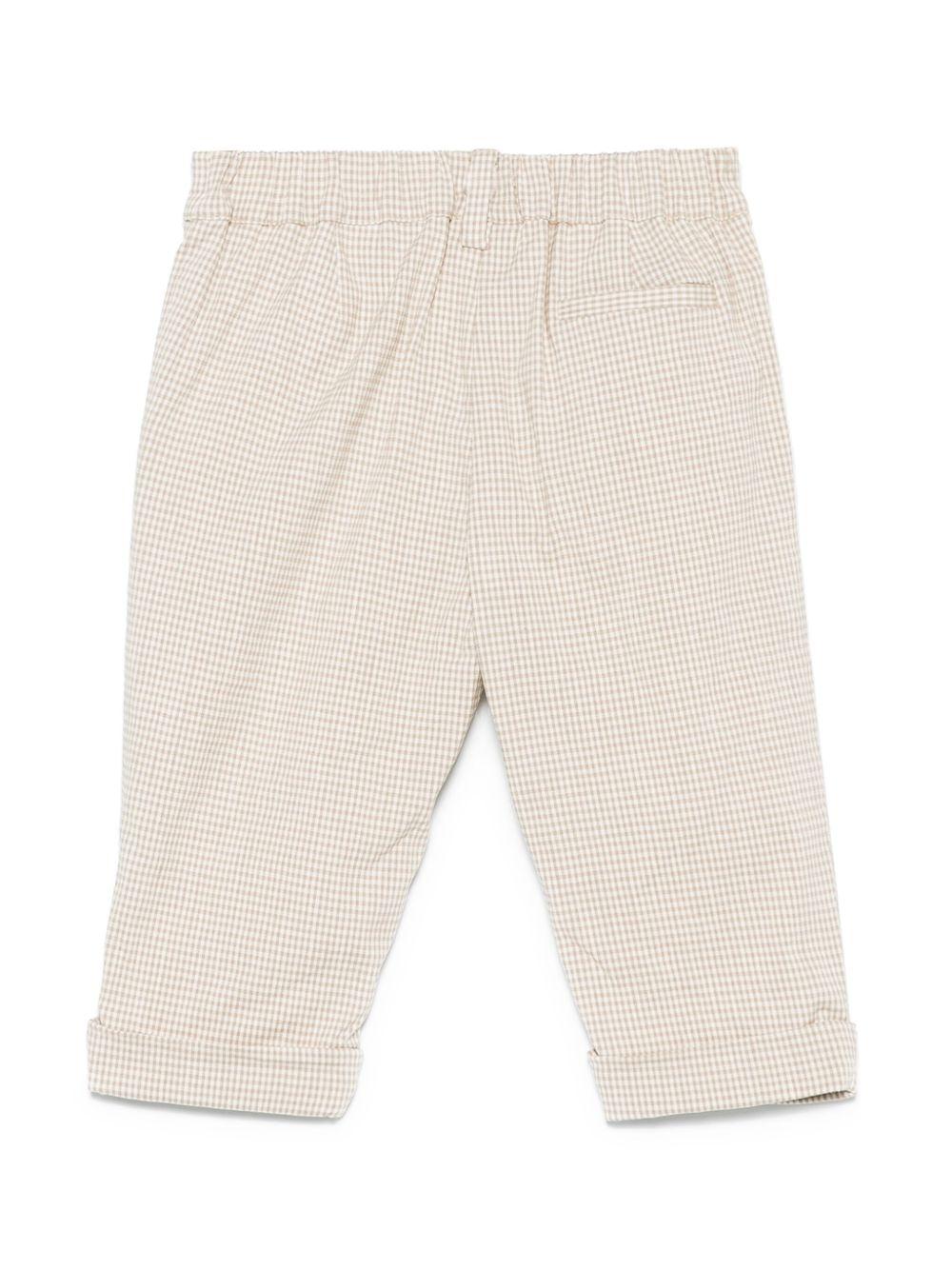 Pantaloni per neonato Fendi Kids beige con motivo a quadri e ricamo logo sulla gamba - Rubino Kids