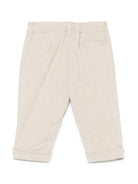 Pantaloni per neonato Fendi Kids beige con motivo a quadri e ricamo logo sulla gamba - Rubino Kids