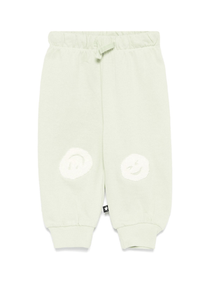 Pantaloni per neonato Molo Simeon verde con motivo smiley