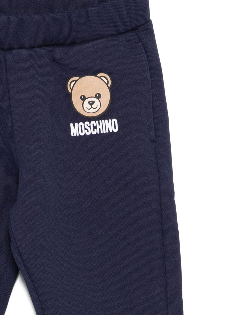 Pantaloni per neonato Moschino Kids blu con logo Teddy Bear - Rubino Kids