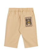 Pantaloni per neonato Moschino Kids marrone con applicazione logo - Rubino Kids
