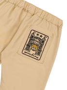 Pantaloni per neonato Moschino Kids marrone con applicazione logo - Rubino Kids