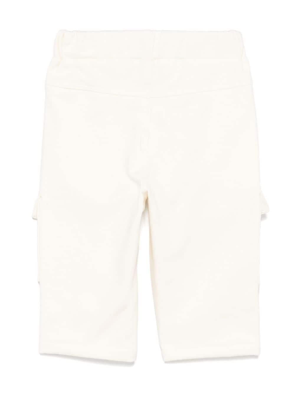 Pantaloni per neonato MSGM Kids bianco con tasche sul davanti - Rubino Kids