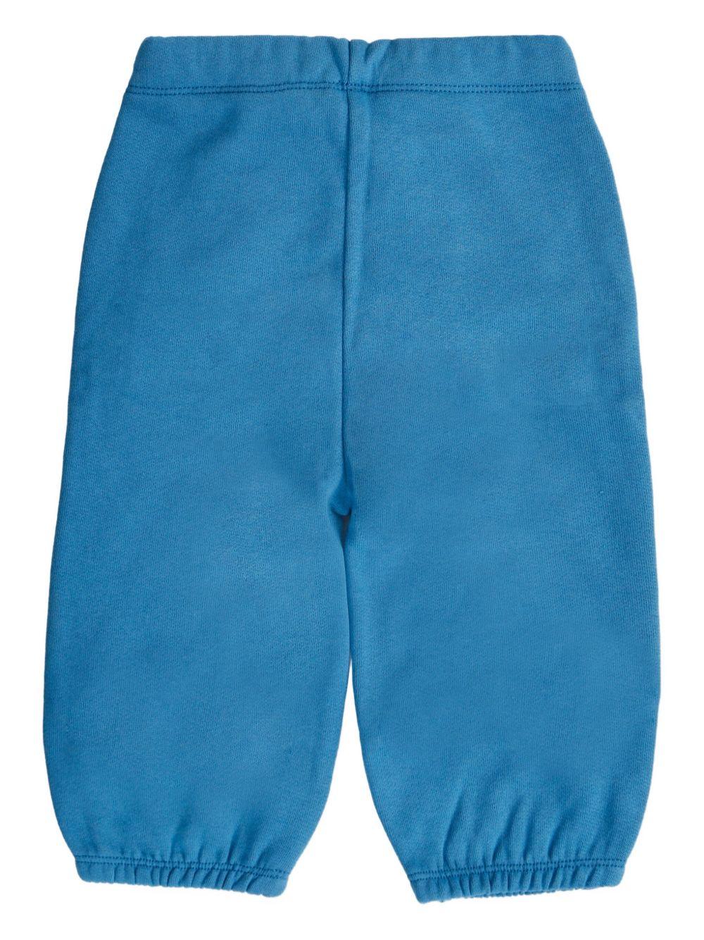 Pantaloni per neonato Stella McCartney Kids blu con stampa grafica - Rubino Kids
