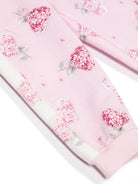 Pantaloni sportivi a fiori per neonata Monnalisa rosa con gamba affusolata - Rubino Kids
