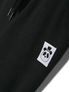 Pantaloni sportivi con applicazione logo per neonato Mini Rodini nero con calzini a coste - Rubino Kids