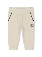 Pantaloni sportivi con applicazione per neonato BOSS Kidswear beige con design a coste - Rubino Kids