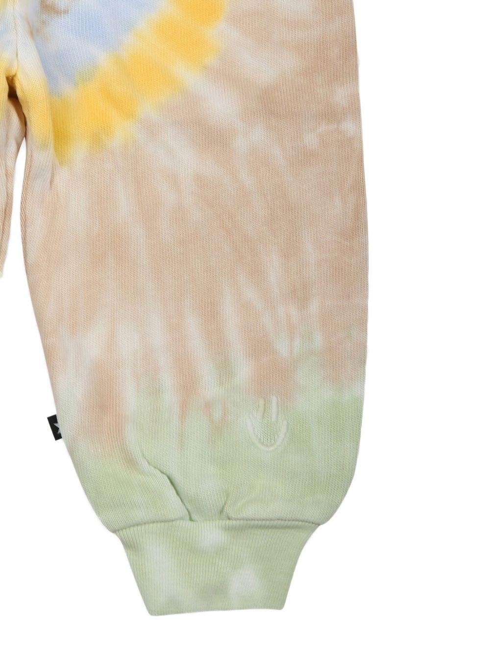 Pantaloni sportivi con fantasia tie - dye per neonato Molo multicolor con mini targhetta logo - Rubino Kids