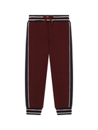 Pantaloni sportivi con logo per bambino Dolce & Gabbana Kids rosso con dettaglio a righe - Rubino Kids
