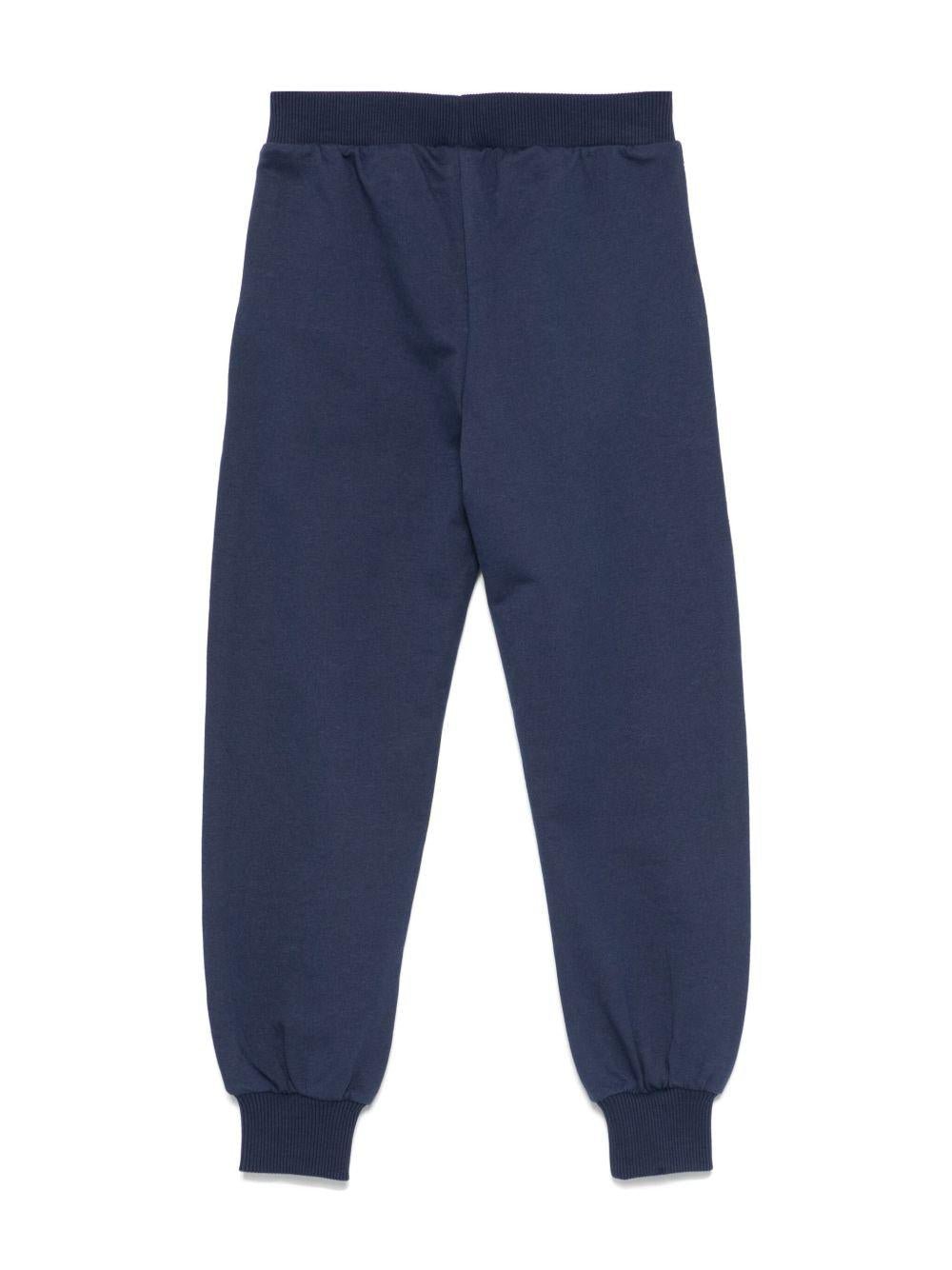 Pantaloni sportivi in cotone per bambino Moschino Kids blu con orli a coste - Rubino Kids