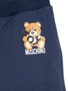 Pantaloni sportivi in cotone per bambino Moschino Kids blu con orli a coste - Rubino Kids