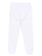 Pantaloni sportivi Moschino Kids bianco con motivo smiley - Rubino Kids