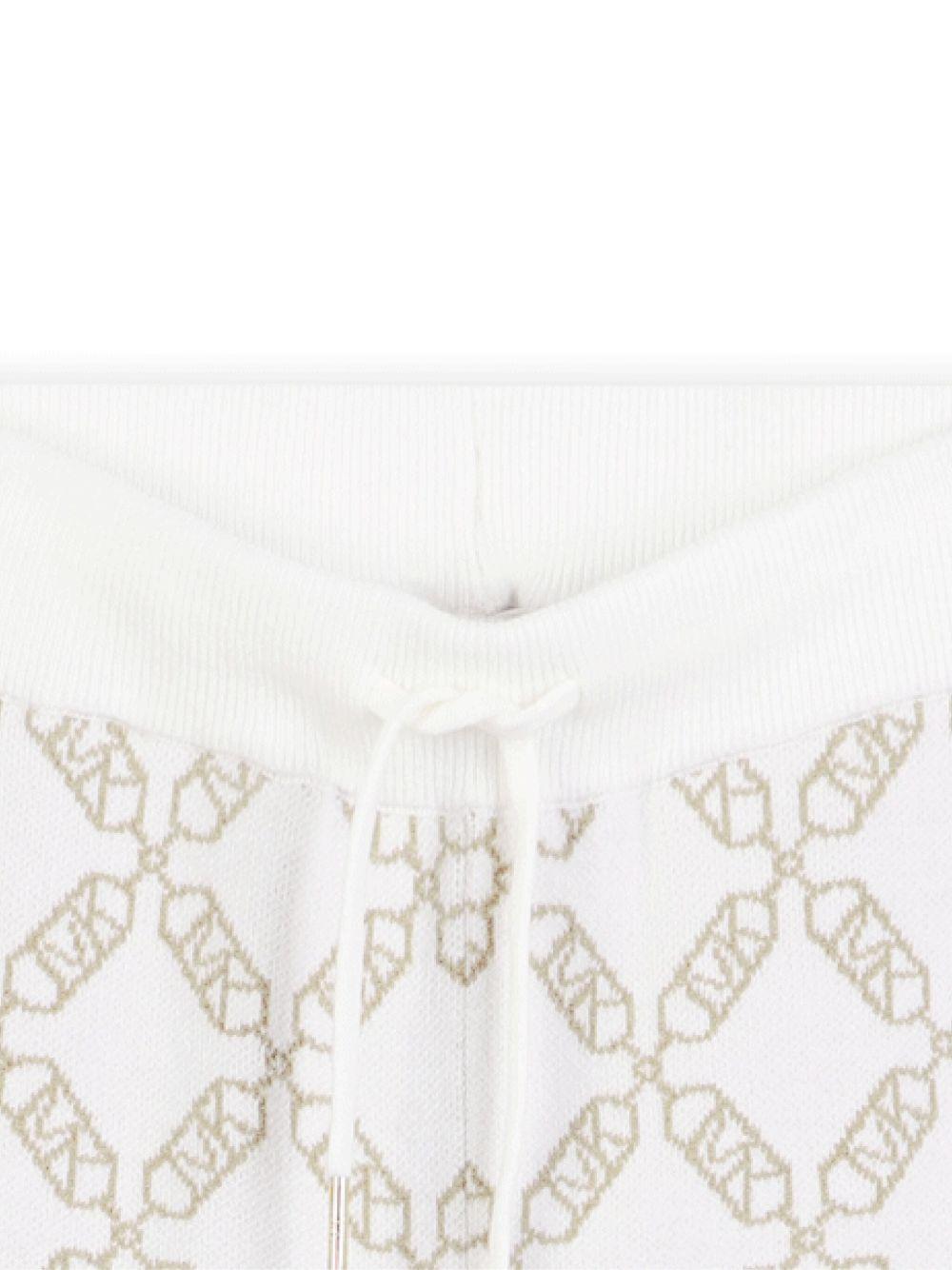 Pantaloni sportivi per bambina Michael Kors Kids bianchi con monogramma - Rubino Kids