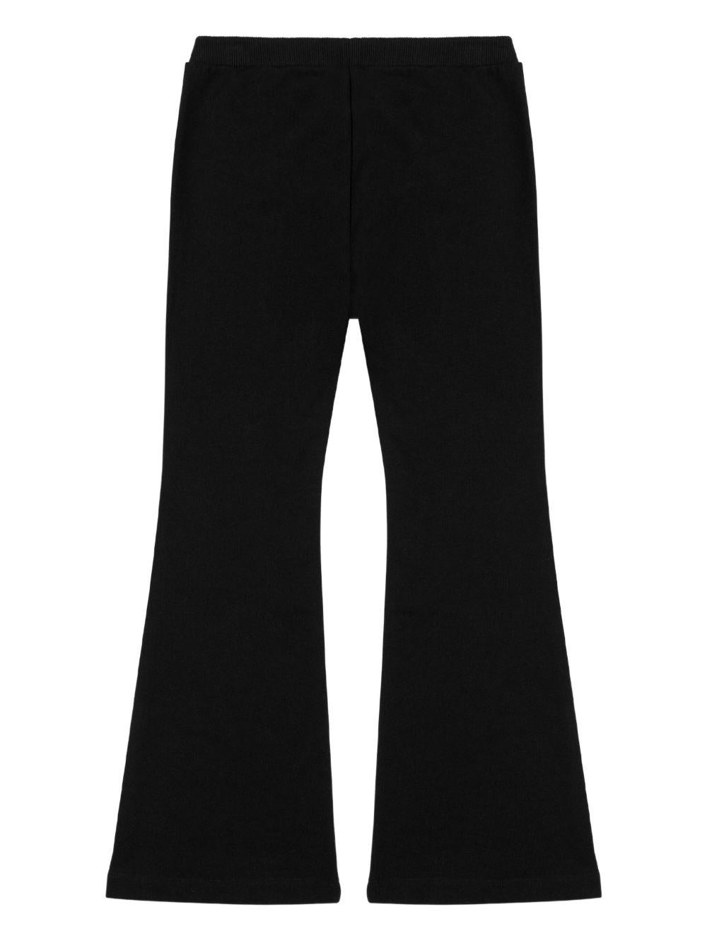 Pantaloni sportivi per bambina Moschino Kids neri con stampa con logo - Rubino Kids