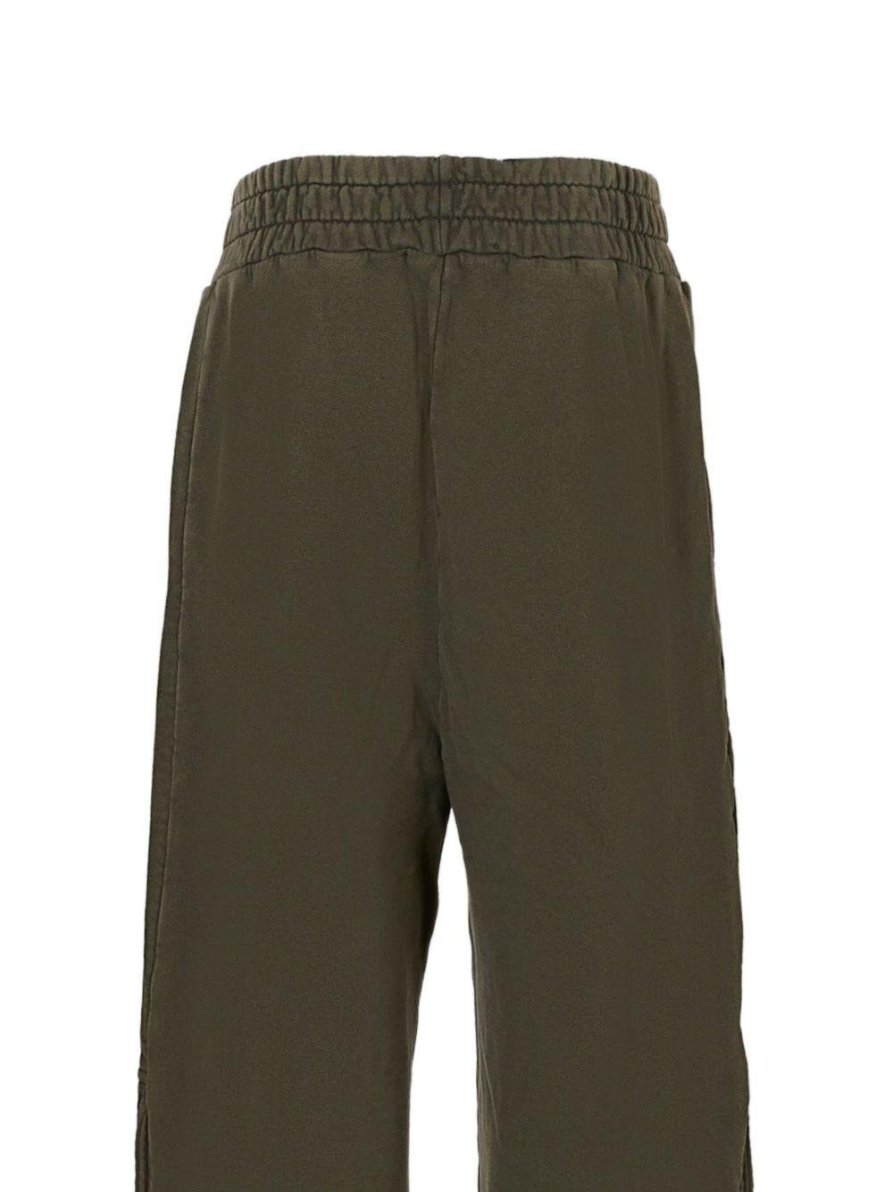 Pantaloni sportivi per bambina MSGM Kids verde con bottoni automatici - Rubino Kids