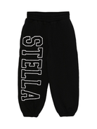 Pantaloni sportivi per bambina Stella McCartney Kids nero con stampa logo sulla gamba - Rubino Kids