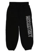 Pantaloni sportivi per bambina Stella McCartney Kids nero con stampa logo sulla gamba - Rubino Kids