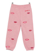 Pantaloni sportivi per bambina Stella McCartney Kids rosa con stampa bacio - Rubino Kids