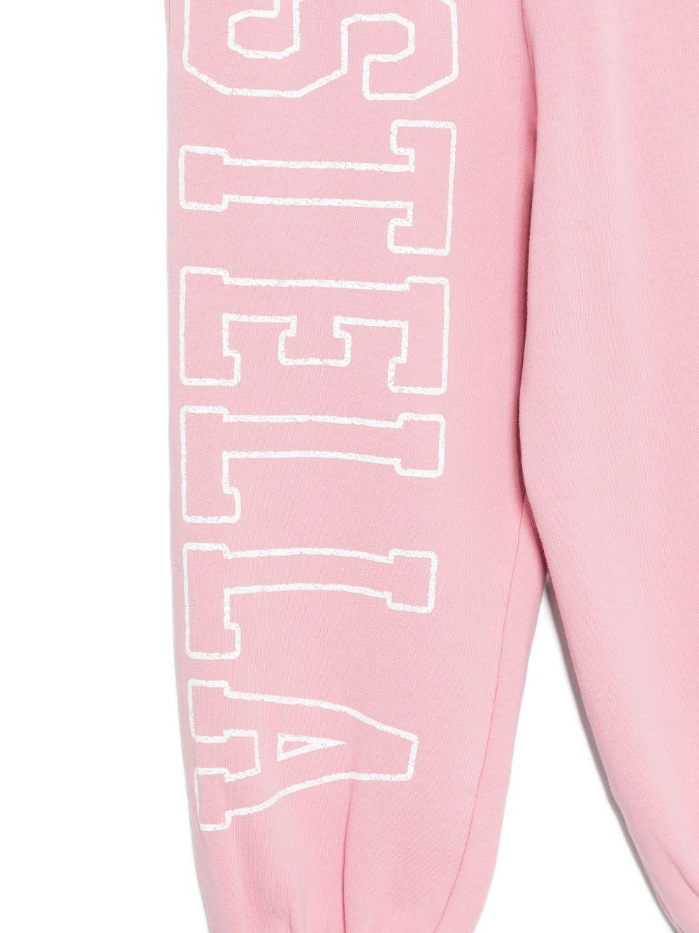 Pantaloni sportivi per bambina Stella McCartney Kids rosa con stampa logo sulla gamba - Rubino Kids