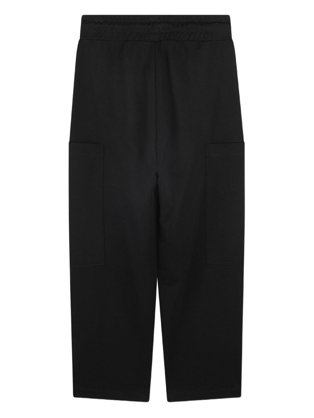 Pantaloni sportivi per bambino Dkny Kids nero con tasche - Rubino Kids
