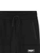 Pantaloni sportivi per bambino Dkny Kids nero con tasche - Rubino Kids