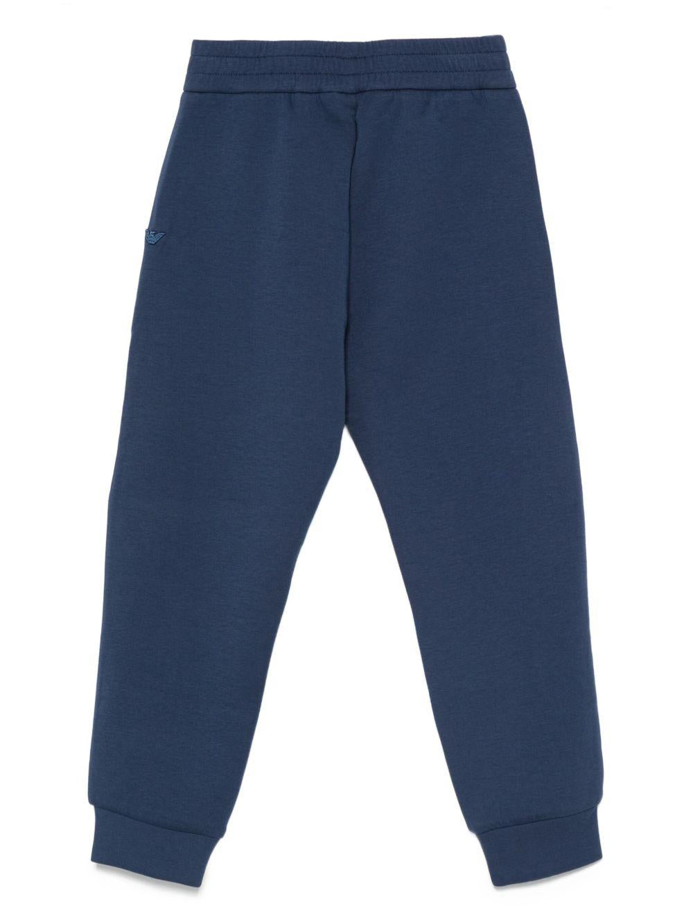 Pantaloni sportivi per bambino Emporio Armani Kids blu con logo - Rubino Kids