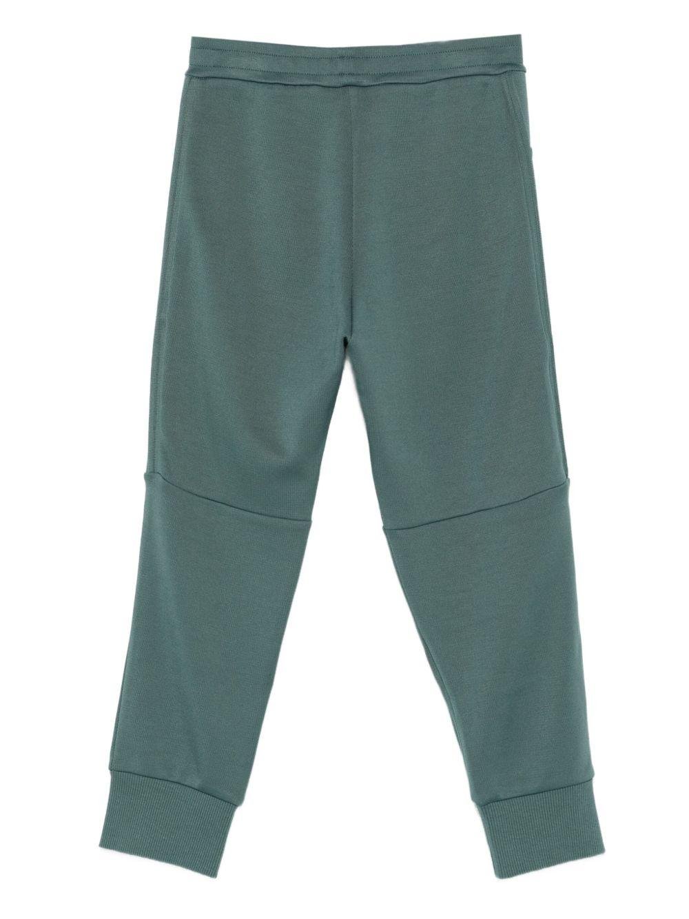 Pantaloni sportivi per bambino Emporio Armani Kids verde con logo in rilievo - Rubino Kids