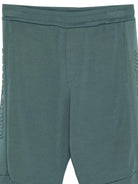 Pantaloni sportivi per bambino Emporio Armani Kids verde con logo in rilievo - Rubino Kids
